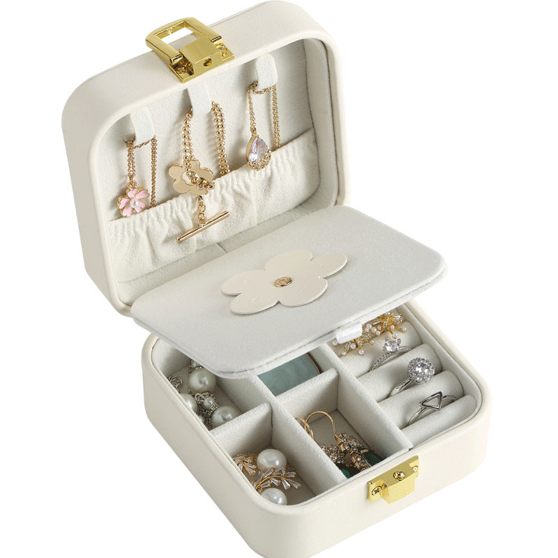 Mini travel jewelry case in beige, open with mirror