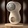 Rechargeable fabric shaver lint remover